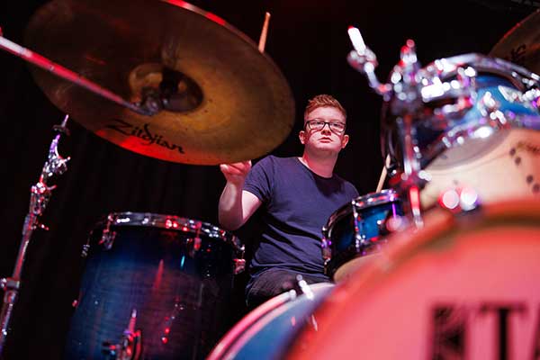 Photo of students making music