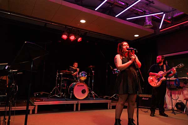 Photo of students making music