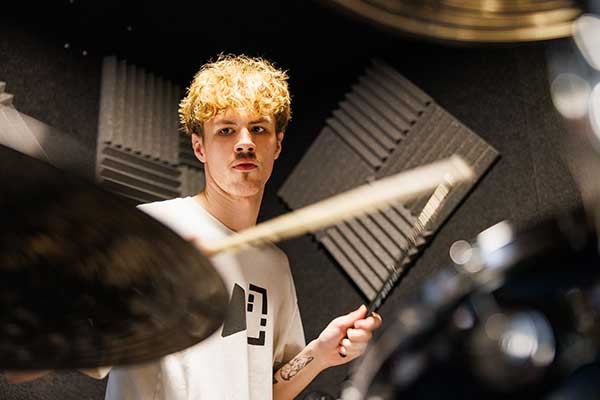 Photo of students making music