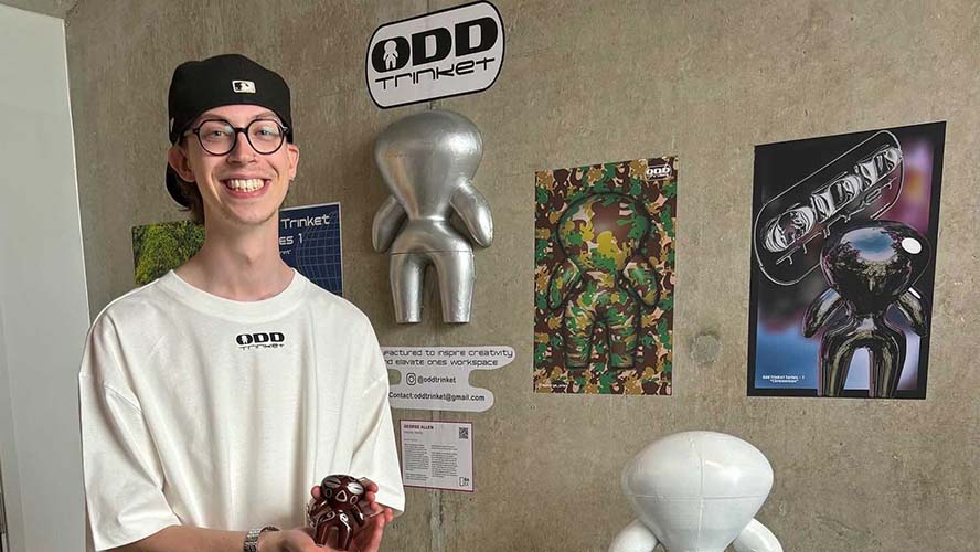 Student/s standing alongside the assets from their enterprise project